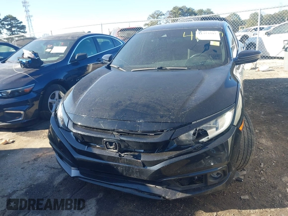 2019 Honda Civic Sport with VIN 2HGFC2F83KH567345, listed as a IAAI auction lot 41353597 with 142,857 mi miles and . Bid and sale history available at DreamBid. Image 6.