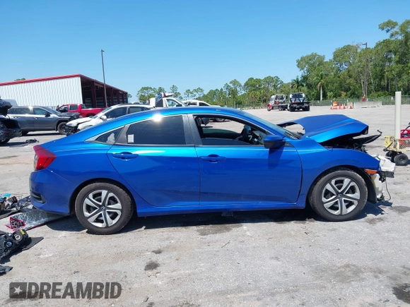 2018 Honda Civic LX with VIN 19XFC2F54JE027744, listed as a IAAI auction lot 42038398 with 119,250 mi miles and . Bid and sale history available at DreamBid. Image 13.