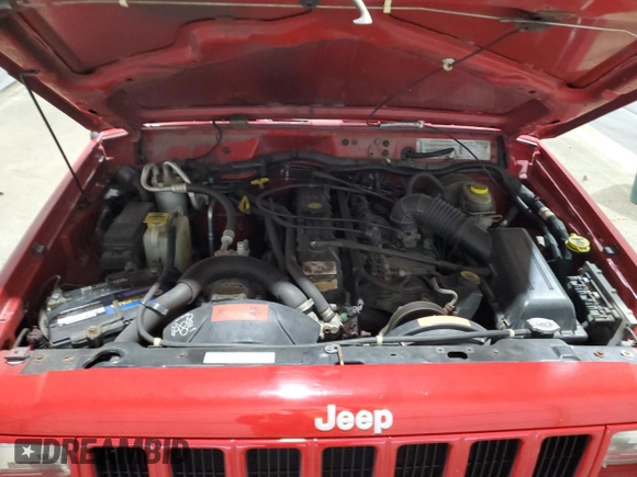 2000 Jeep Cherokee z VIN 1J4FF48S9YL260200, wystawiony jako Copart lot #52471365 z przebiegiem 89 435 mil mil oraz Szkody całkowita. Historia ofert i sprzedaży dostępna na DreamBid. Obrazek 11.