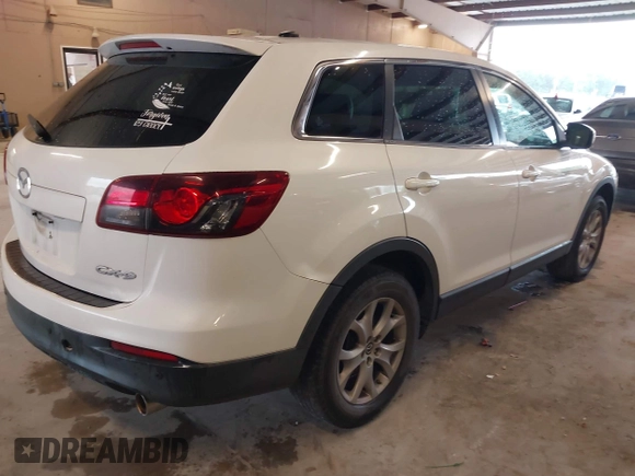 2014 Mazda CX-9 Touring with VIN JM3TB2CA8E0430199, listed as a IAAI auction lot 42090612 with 188,412 mi miles and . Bid and sale history available at carsss.com. Image 4.