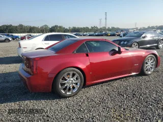 2006 Cadillac XLR z VIN 1G6YV36A465601366, wystawiony jako Copart lot #76229944 z przebiegiem 33 159 mil mil oraz Nie do naprawy. Historia ofert i sprzedaży dostępna na DreamBid. Obrazek 3.