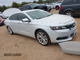 2018 Chevrolet Impala Premier with VIN 1G1125S35JU105381, listed as a IAAI auction lot 41942786 with 142,196 mi miles and . Bid and sale history available at DreamBid. Image 1.