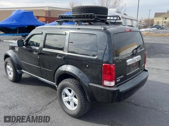 2008 Dodge Nitro SLT z VIN 1D8GU58K68W145253, wystawiony jako Copart lot #43768705 z przebiegiem 167 904 mil mil oraz Czysty tytuł • Clean title. Historia ofert i sprzedaży dostępna na DreamBid. Obrazek 3.