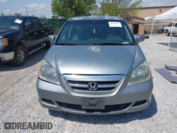 2007 Honda Odyssey EX with VIN 5FNRL38457B042912, listed as a IAAI auction lot 41992847 with 194,822 mi miles and . Bid and sale history available at DreamBid. Image 12.