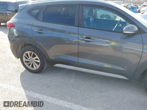 2017 Hyundai Tucson SE Plus with VIN KM8J33A40HU459575, listed as a IAAI auction lot 41703139 with 189,955 mi miles. Bid and sale history available at carsss.com. Image 6.