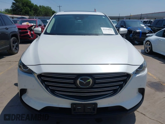 2019 Mazda CX-9 Touring z VIN JM3TCBCY2K0300702, wystawiony jako IAAI lot #42194050 z przebiegiem 98 247 mil mil oraz . Historia ofert i sprzedaży dostępna na DreamBid. Obrazek 12.