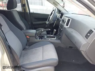 2010 Jeep Grand Cherokee Laredo with VIN 1J4PS4GK6AC136702, listed as a IAAI auction lot 42066484 with 126,509 mi miles. Bid and sale history available at carsss.com. Image 5.
