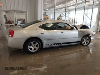 2010 Dodge Charger SXT with VIN 2B3CA3CV1AH291075, listed as a IAAI auction lot 41576216 with 144,602 mi miles. Bid and sale history available at carsss.com. Image 13.