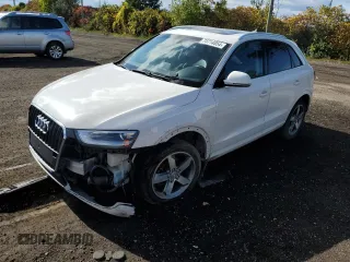 2015 Audi Q3 with VIN WA1EFEFS5FR009981, listed as a Copart auction lot 73714854 with 157,693 mi miles and Salvage title. Bid and sale history available at DreamBid. Image 1.