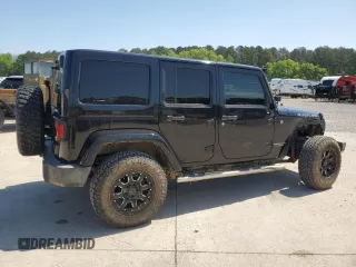 2016 Jeep Wrangler Unlimited Rubicon with VIN 1C4BJWFG5GL290757, listed as a Copart auction lot 52099225 with 102,424 mi miles and Salvage title. Bid and sale history available at DreamBid. Image 3.