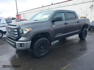 2018 Toyota Tundra 4WD SR5 with VIN 5TFDY5F14JX768998, listed as a IAAI auction lot 41593799 with 146,673 mi miles. Bid and sale history available at carsss.com. Image 2.