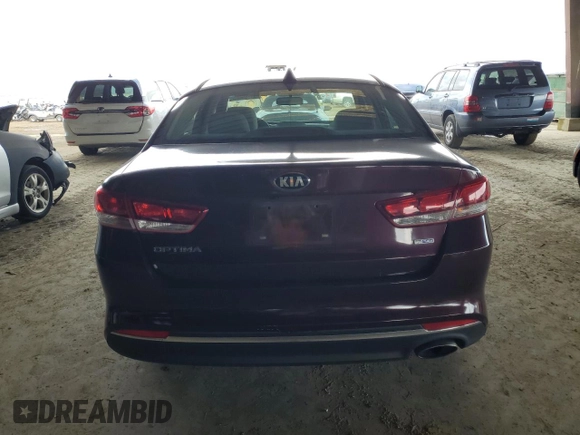 2016 Kia Optima LX Turbo with VIN 5XXGT4L11GG036452, listed as a Copart auction lot 50985605 with 106,581 mi miles and Clean Title. Bid and sale history available at carsss.com. Image 6.