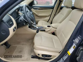 2013 BMW X1 xDrive28i z VIN WBAVL1C52DVR83974, wystawiony jako Copart lot #53567905 z przebiegiem 96 688 mil mil oraz Szkoda całkowita • Salvage title. Historia ofert i sprzedaży dostępna na DreamBid. Obrazek 7.