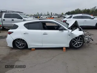 2015 Lexus CT 200h with VIN JTHKD5BH0F2234146, listed as a IAAI auction lot 42583102 with Not provided miles and . Bid and sale history available at DreamBid. Image 14.