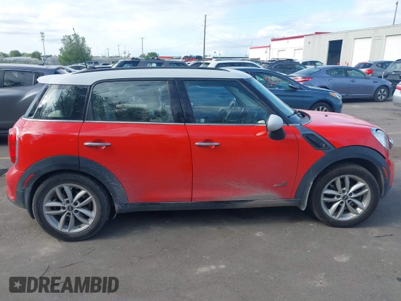 2012 MINI Countryman S with VIN WMWZC5C54CWM13041, listed as a IAAI auction lot 42244303 with 139,733 mi miles and . Bid and sale history available at DreamBid. Image 13.