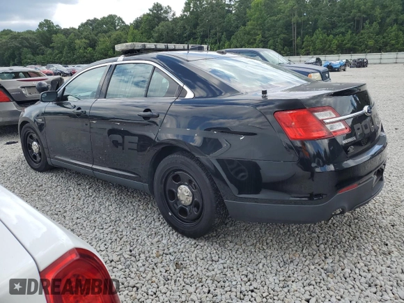 2014 Ford Police Interceptor with VIN 1FAHP2L82EG105333, listed as a Copart auction lot 66361525 with 101,176 mi miles and Clean title. Bid and sale history available at DreamBid. Image 2.