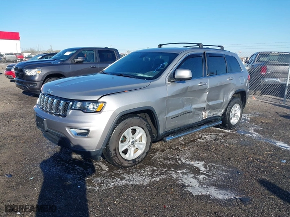 2017 Jeep Grand Cherokee Laredo with VIN 1C4RJEAG3HC890386, listed as a IAAI auction lot 41790836 with 67,166 mi miles. Bid and sale history available at carsss.com. Image 18.