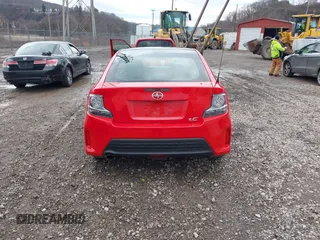2014 Scion tC z VIN JTKJF5C76E3078810, wystawiony jako IAAI lot #41638613 z przebiegiem 76 648 mil mil oraz . Historia ofert i sprzedaży dostępna na DreamBid. Obrazek 17.