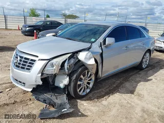 2015 Cadillac XTS Luxury with VIN 2G61N5S36F9251701, listed as a IAAI auction lot 40315224 with 99,918 mi miles. Bid and sale history available at carsss.com. Image 2.
