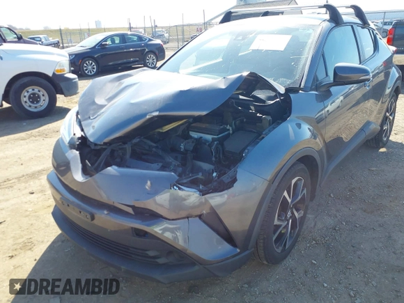 2019 Toyota C-HR XLE with VIN JTNKHMBX4K1025527, listed as a IAAI auction lot 41807738 with 64,505 mi miles and . Bid and sale history available at DreamBid. Image 6.