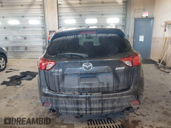 2015 Mazda CX-5 Touring with VIN JM3KE2CY2F0458114, listed as a IAAI auction lot 41545493 with 138,061 mi miles. Bid and sale history available at carsss.com. Image 17.