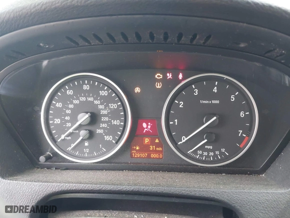 2009 BMW X5 30i with VIN 5UXFE43579L271366, listed as a IAAI auction lot 41831724 with 129,107 mi miles. Bid and sale history available at carsss.com. Image 7.