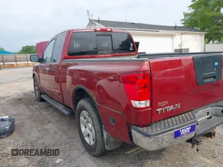 2004 Nissan Titan SE with VIN 1N6AA06A94N545539, listed as a IAAI auction lot 42036468 with 212,269 mi miles. Bid and sale history available at carsss.com. Image 3.