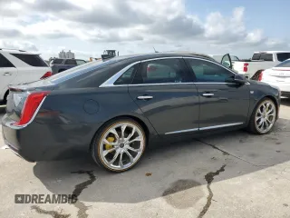 2018 Cadillac XTS Luxury z VIN 2G61M5S30J9135292, wystawiony jako Copart lot #57121115 z przebiegiem 95 110 mil mil oraz Szkoda całkowita • Salvage title. Historia ofert i sprzedaży dostępna na DreamBid. Obrazek 3.