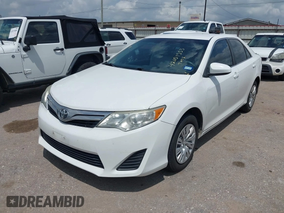 2014 Toyota Camry L with VIN 4T4BF1FK2ER375590, listed as a IAAI auction lot 42101553 with 126,849 mi miles and . Bid and sale history available at DreamBid. Image 17.
