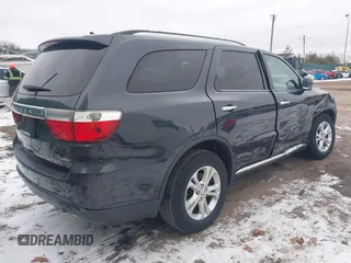 2013 Dodge Durango Crew z VIN 1C4SDJDT7DC684766, wystawiony jako IAAI lot #41277670 z przebiegiem 115 555 mil mil oraz . Historia ofert i sprzedaży dostępna na DreamBid. Obrazek 4.