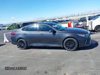 2016 Kia Optima SX Turbo with VIN 5XXGW4L29GG091635, listed as a IAAI auction lot 41884813 with 121,764 mi miles and . Bid and sale history available at carsss.com. Image 13.