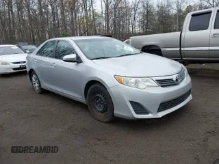 2012 Toyota Camry L with VIN 4T1BF1FK6CU572432, listed as a IAAI auction lot 41951610 with 242,977 mi miles. Bid and sale history available at carsss.com. Image 1.