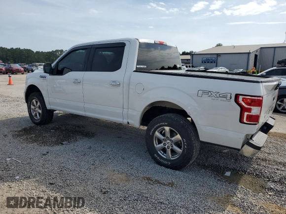 2018 Ford F-150 XL with VIN 1FTEW1E59JFA28036, listed as a Copart auction lot 57181525 with 121,384 mi miles and Salvage title. Bid and sale history available at DreamBid. Image 2.