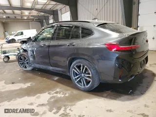 2022 BMW X4 M with VIN 5YM23EC05N9J23246, listed as a Copart auction lot 48730835 with 0 mi miles and Salvage Title. Bid and sale history available at carsss.com. Image 2.
