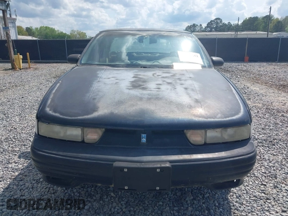 1996 Oldsmobile Cutlass Supreme S z VIN 1G3WH52M2TF363353, wystawiony jako IAAI lot #41955292 z przebiegiem 143 347 mil mil oraz . Historia ofert i sprzedaży dostępna na DreamBid. Obrazek 15.