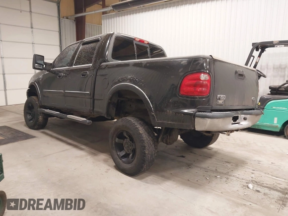 2002 Ford F-150 XLT with VIN 1FTRW08L62KC00490, listed as a IAAI auction lot 41380406 with 192,013 mi miles. Bid and sale history available at carsss.com. Image 3.