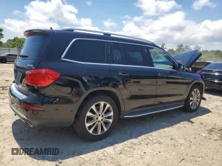 2015 Mercedes-Benz GL-Class GL 450 with VIN 4JGDF6EE1FA562088, listed as a Copart auction lot 58736934 with 104,550 mi miles and Salvage Title. Bid and sale history available at carsss.com. Image 3.