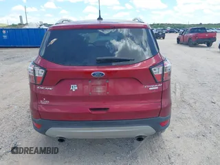 2018 Ford Escape Titanium with VIN 1FMCU0J96JUD58854, listed as a IAAI auction lot 42590609 with 77,825 mi miles and . Bid and sale history available at DreamBid. Image 16.