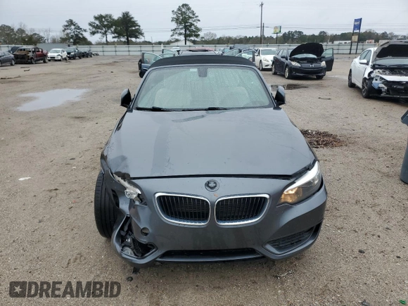 2015 BMW 2 Series 228i with VIN WBA1K5C57FV474037, listed as a Copart auction lot 87857635 with 91,333 mi miles and Salvage title. Bid and sale history available at DreamBid. Image 5.