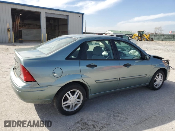 2003 Ford Focus SE with VIN 1FAFP34P63W294459, listed as a Copart auction lot 49710355 with 69,449 mi miles and Salvage Title. Bid and sale history available at carsss.com. Image 3.