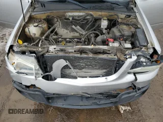 2011 Mazda Tribute Sport with VIN 4F2CY9C70BKM03826, listed as a Copart auction lot 45222665 with 171,082 mi miles and Salvage Title. Bid and sale history available at DreamBid. Image 12.