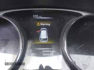 2016 Nissan Rogue SL with VIN 5N1AT2MT6GC899673, listed as a IAAI auction lot 42008141 with 164,669 mi miles and . Bid and sale history available at carsss.com. Image 7.