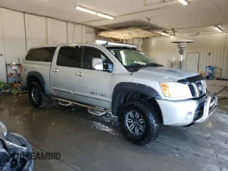 2005 Nissan Titan LE with VIN 1N6AA07B25N505392, listed as a Copart auction lot 50221945 with 187,780 mi miles and Salvage Title. Bid and sale history available at carsss.com. Image 4.