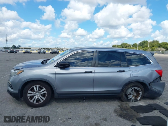 2016 Honda Pilot LX with VIN 5FNYF6H1XGB099987, listed as a IAAI auction lot 41556979 with 98,373 mi miles. Bid and sale history available at carsss.com. Image 14.