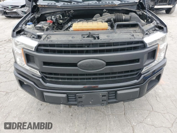 2018 Ford F-150 XL с VIN 1FTEX1CB0JKC76740, выставлен на аукционе Copart как лот 57258325 с пробегом 100 032 миль миль и Списание • Salvage title. История ставок и продаж доступна на DreamBid. Изображение 11.