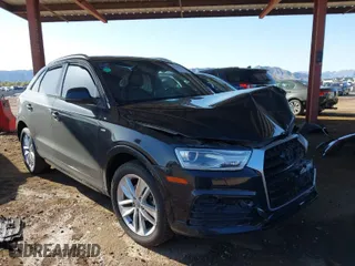 2018 Audi Q3 Premium with VIN WA1BCCFS5JR007740, listed as a IAAI auction lot 41763415 with 73,934 mi miles. Bid and sale history available at carsss.com. Image 1.