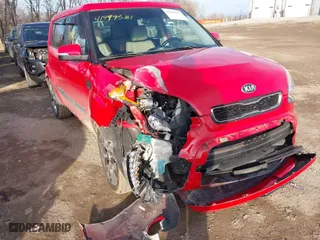 2013 Kia Soul + with VIN KNDJT2A67D7616379, listed as a IAAI auction lot 41499581 with 90,276 mi miles. Bid and sale history available at carsss.com. Image 1.