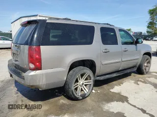 2007 GMC Yukon XL SLT z VIN 1GKFK16387J173009, wystawiony jako Copart lot #54010965 z przebiegiem 264 446 mil mil oraz Czysty tytuł • Clean title. Historia ofert i sprzedaży dostępna na DreamBid. Obrazek 3.