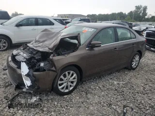 2013 Volkswagen Jetta SE with VIN 3VWDX7AJ5DM393023, listed as a Copart auction lot 65710275 with Not provided miles and Clean title. Bid and sale history available at DreamBid. Image 1.