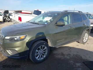 2020 Jeep Cherokee Latitude with VIN 1C4PJLCB7LD654808, listed as a IAAI auction lot 41260479 with 74,824 mi miles. Bid and sale history available at carsss.com. Image 2.